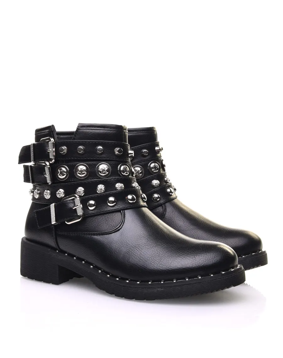 Bottines noires avec différentes lanières cloutées 