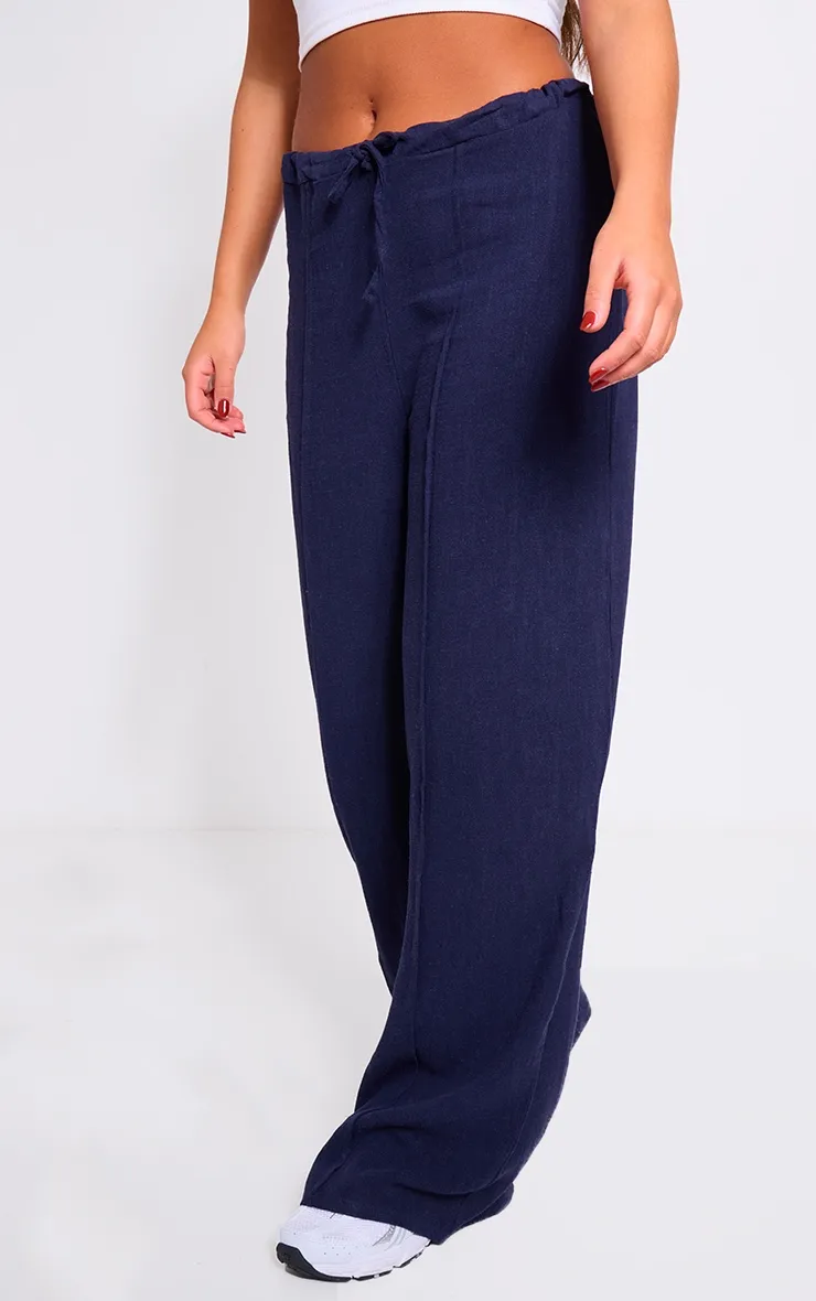 Pantalon ample à pinces en effet lin bleu marine