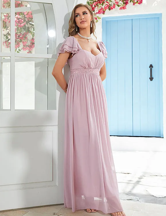 Robe en mousseline de soie rose pâle à col en V profond