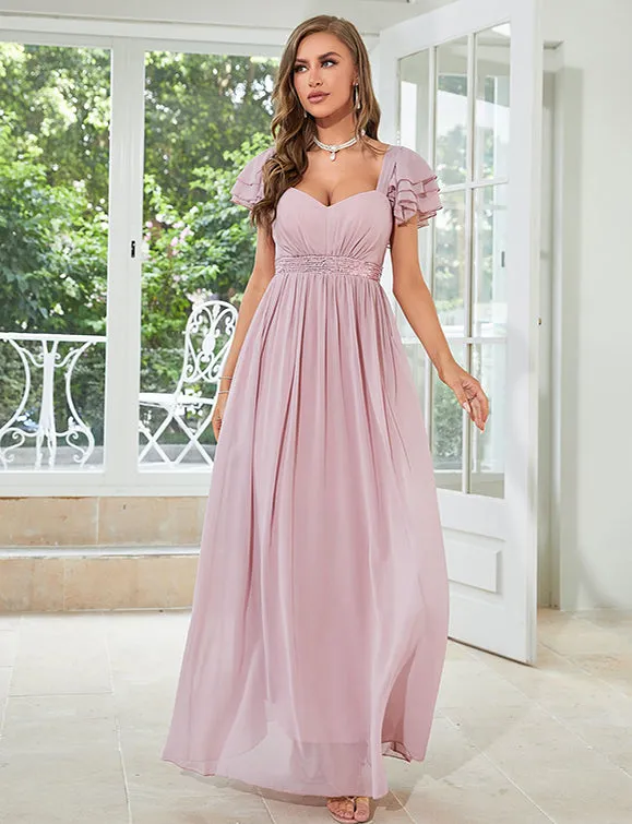 Robe en mousseline de soie rose pâle à col en V profond