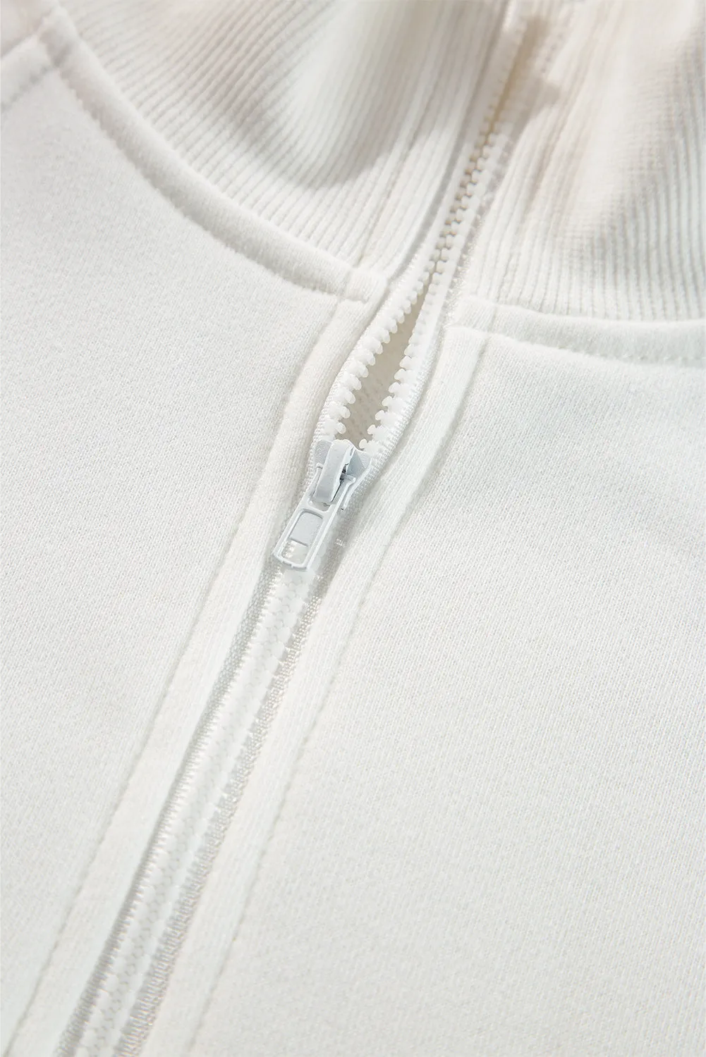 Sweat-shirt blanc à col zippé et épaules tombantes