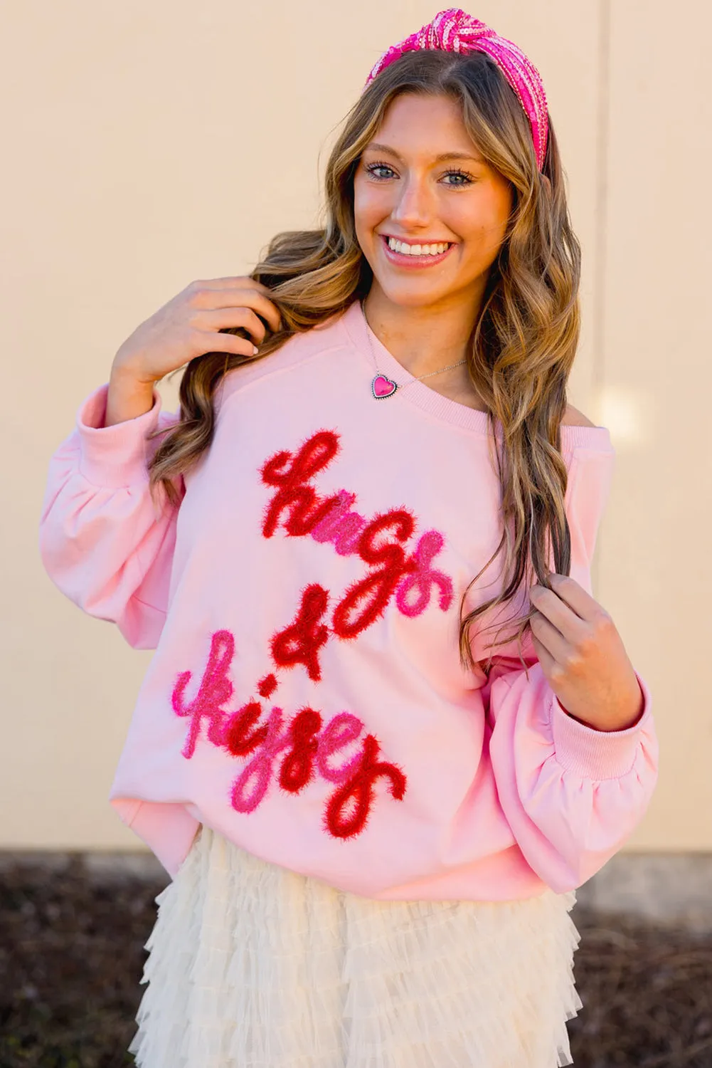 Sweat-shirt rose à manches raglan brodées Hugs and Kisses Pop Up