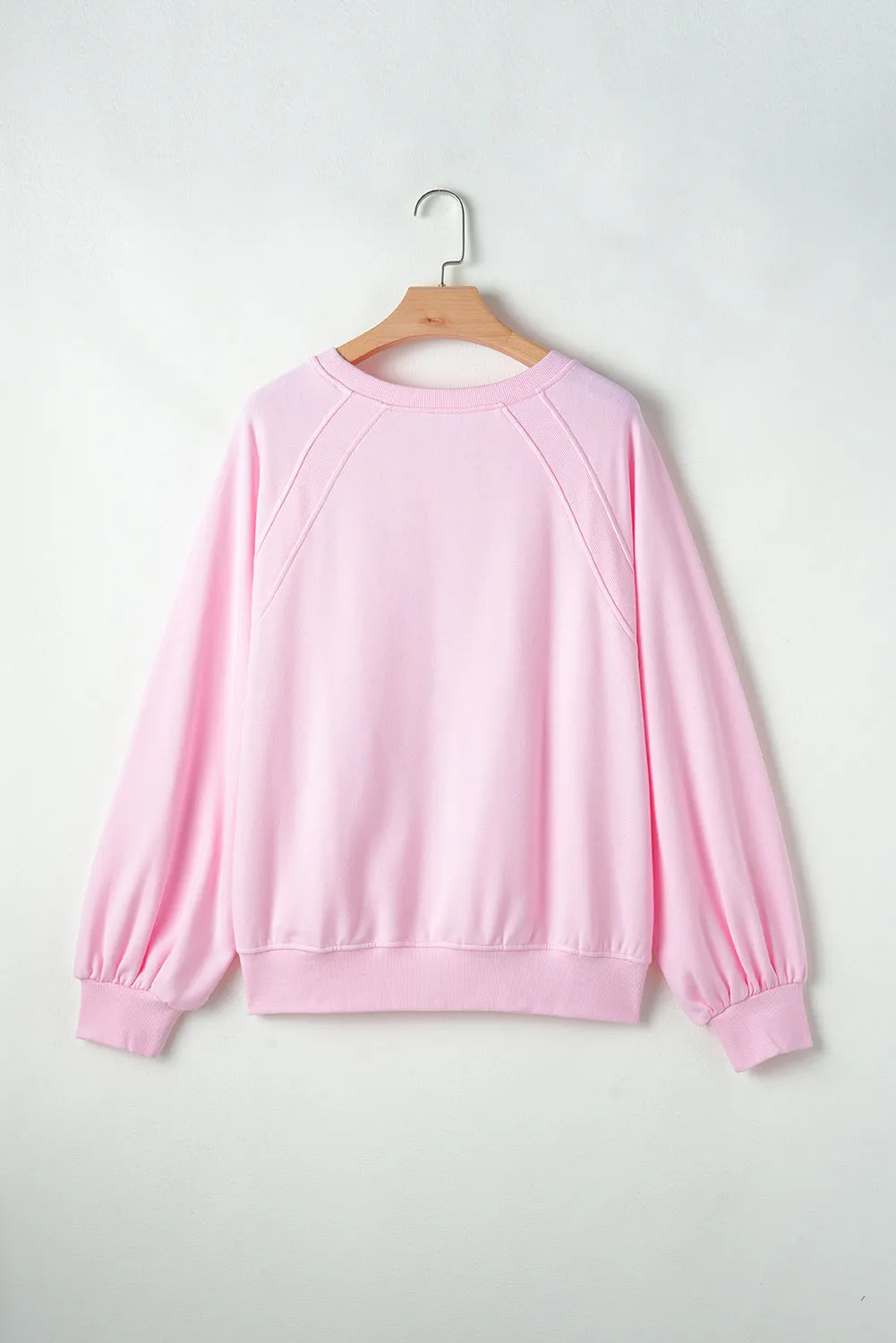 Sweat-shirt rose à manches raglan brodées Hugs and Kisses Pop Up