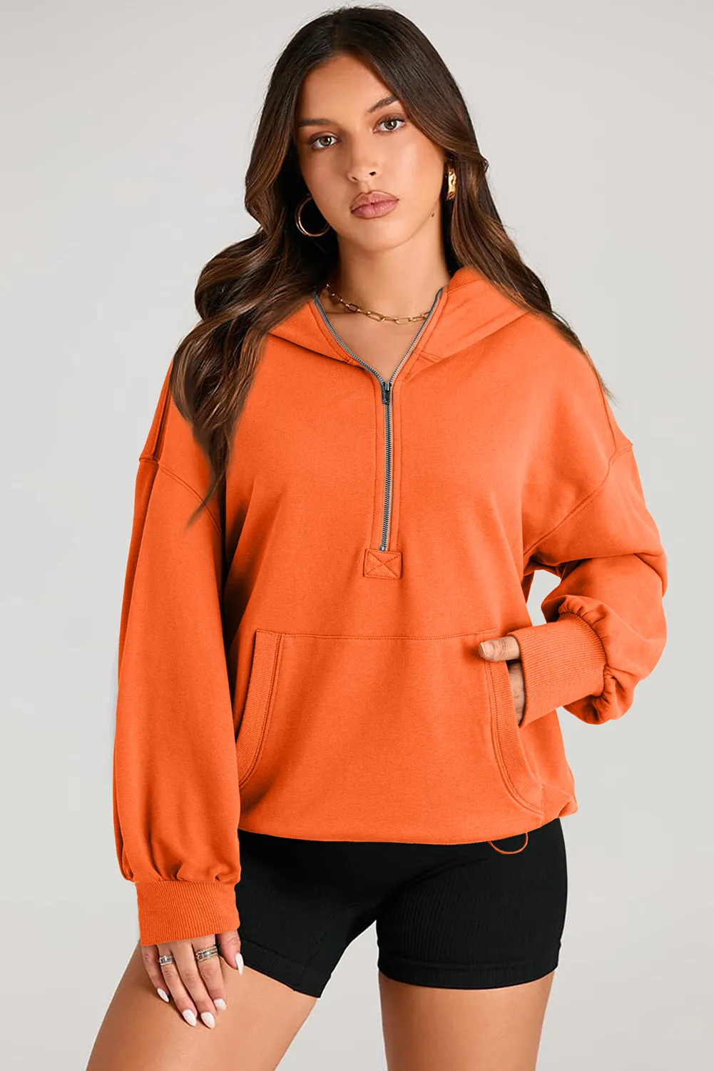 Sweat à capuche surdimensionné orange uni avec poche kangourou et demi-fermeture éclair